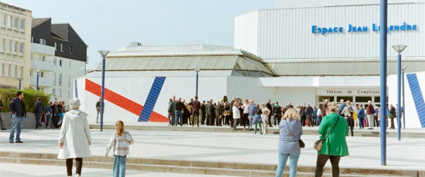 Crowd gathered at Espace Jean Legendre Theater in Compiegne, France.